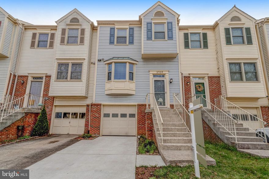 Welcome to this meticulously updated 3-level interior townhouse, boasting 3 bedrooms, 3.5 bathrooms, and an attached one-car garage. This charming home offers a perfect blend of contemporary living and classic comfort. Renovated in 2018, this home features a refreshed interior with attention to detail. Enjoy the convenience of a new water heater installed in 2022, along with a recently replaced driveway for added curb appeal and functionality. The main level features a seamless living room/dining room combination anchored by a cozy wood fireplace, creating a warm ambiance for gatherings and relaxation. Delight in the sleek stainless-steel appliances, crisp white cabinets, and elegant granite countertops in the kitchen, complemented by custom herringbone tile flooring and a charming bay window. Retreat to the upper level where two bedrooms await, each with vaulted ceilings and ceiling fans, along with their own private bathrooms for added convenience. The laundry is conveniently located on this level, making chores a breeze. The finished basement offers additional living space, complete with a bedroom and full bathroom, providing flexibility for various lifestyle needs. Step outside to your private oasis, complete with a wood deck, brick patio, and fenced backyard, offering a serene retreat backing to trees, perfect for outdoor entertainment or quiet relaxation. Situated near shopping centers and Fort Belvoir, this property offers easy access to daily essentials and commuting routes, making it an ideal choice for busy lifestyles. Don't miss the opportunity to make this modern and conveniently located townhouse your new home sweet home!