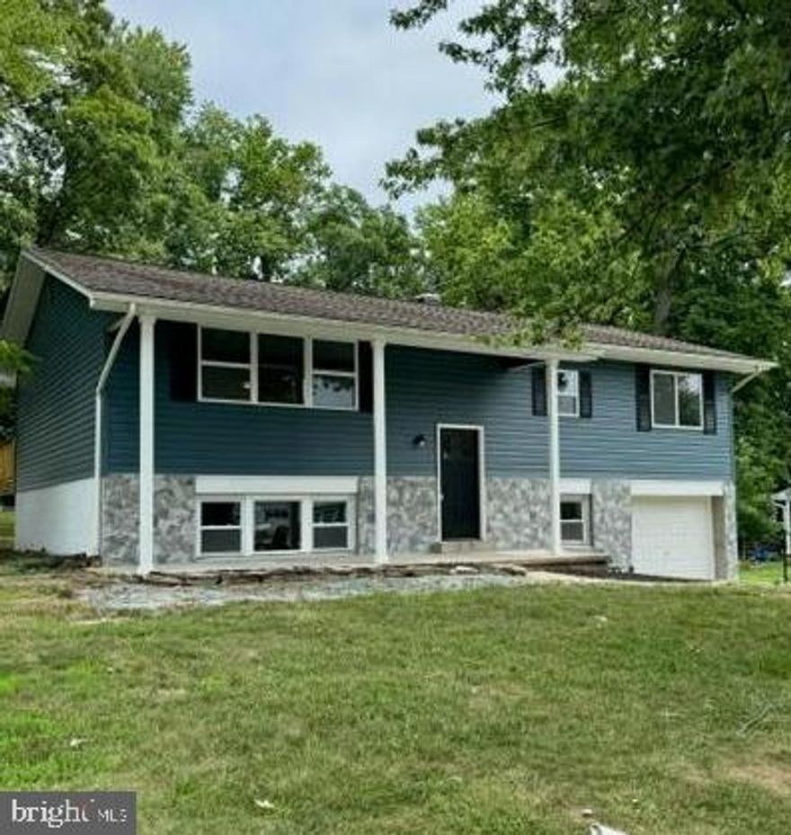 Special Price Improvement! A wonderfully renovated 5 bedrooms 3 bath home. This open and bright home offers new kitchen cabinets, quartz counters, stainless appliances with gas range, new water heater, luxury vinyl flooring, beautifully renovated baths with porcelain tile and much more. 
The exterior of this home has also received a makeover. Boasting a new windows, deck, siding and stone on a .39 corner lot located in an established neighborhood and convenient to major highways, schools and shopping. 
Come see all this home has to offer!