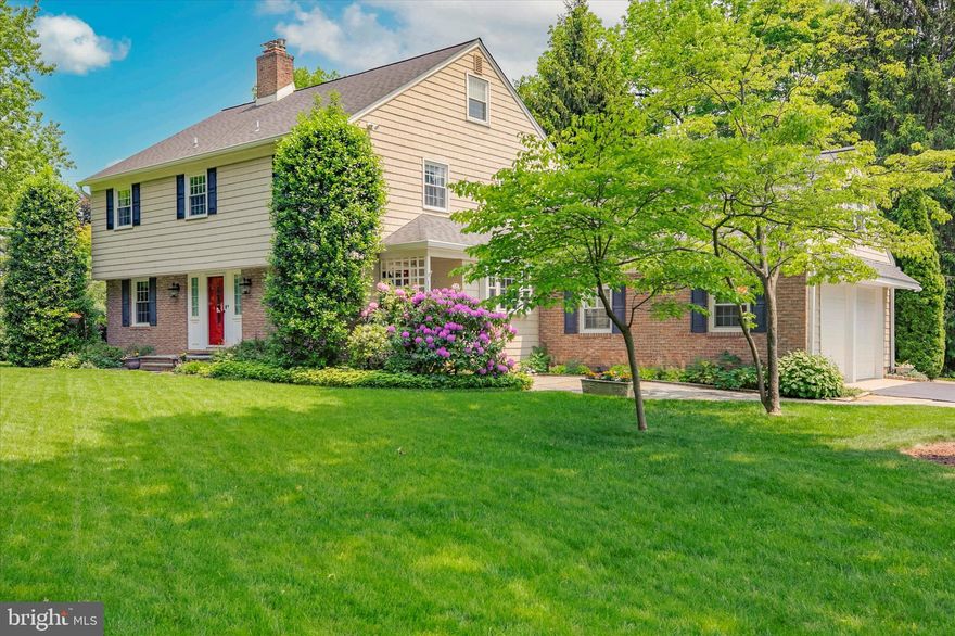 Welcome to 1161 Rossiter Lane! This updated and well-maintained Wayne home epitomizes refined suburban living with its blend of sophistication, comfort, and convenience. This immaculately presented residence offers a seamless fusion of traditional charm and modern updates, making it a haven for those seeking both elegance and functionality. As you step inside, you are welcomed by an inviting foyer that sets the tone for the home’s gracious interior. The main level features a meticulously designed layout, beginning with a bright and airy office/den with glass door, built-in book shelves, and a wood burning fireplace. An adjacent  powder room plus a full-sized coat closet provide convenience for guests. The living room exudes warmth and character with its crown molding, a stone fireplace (gas/propane) that serves as a focal point, and recessed lighting, creating an ideal ambiance for relaxation or entertaining. Adjacent to the living room, the dining room is perfect for formal gatherings, featuring ample space and elegant detailing. The sunroom, bathed in natural light, offers serene views of the beautifully landscaped yard and gardens, providing a tranquil retreat for year-round enjoyment and access to the rear patio. The heart of the home lies in the updated eat-in kitchen, which is a chef’s delight with its modern amenities. Highlights include custom cabinetry, a central island,  quartz countertops, under cabinet lighting with plentiful outlets, and premium GE stainless steel appliances, ensuring both style and functionality. Off of the kitchen is access to both the attached oversized two-car garage AND the bonus room above the garage. This room is accessed by its own staircase and provides additional flexibility for use as a tranquil home office or recreation area, accommodating various lifestyle needs with ease. Upstairs, off the main staircase, the second level hosts four large, well-appointed bedrooms, including a primary suite that offers a sanctuary with its own en-suite bathroom and ample closet space (walk-in closet and two double closets). Also featured on this level are two hall linen closets and a gorgeous, renovated hall bathroom with quartz double vanity, custom cabinetry, oversized tub/shower, and heated floors. There is also walk-up access to a large, floored attic. This space features blown-in insulation for energy efficiency plus plentiful storage capacity. The lower level boasts a finished basement with its own heating zone featuring luxury vinyl flooring, bead board paneling, recessed lighting, with multiple living/activity spaces as well as a large and clean unfinished area, which includes the laundry, oversized sink, and ample storage space. Outside, the one-acre property continues to impress with its flat, expansive yard and meticulously maintained gardens, creating a picturesque backdrop for outdoor gatherings, gardening, and leisure activities. A beautiful patio extends the living space outdoors, perfect for al fresco dining or simply enjoying the peaceful surroundings. Other notable features of the home include: electrical panel hook-up for a generator, hardwood floors under most of the carpeted areas, a booster pump that maintains perfect water pressure throughout the home, and a new A/C system (2024). Located in a highly desirable community known for its excellent schools (Tredyffrin/Easttown), proximity to shopping, dining, and recreational amenities, 1161 Rossiter Lane offers not just a residence, but a lifestyle of comfort, convenience, and timeless elegance. This must-see Wayne home is an exceptional opportunity to embrace Main Line living at its finest!