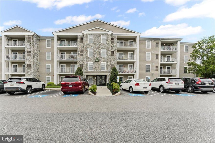 Welcome to 615 Brandon Road, located in the Greens at Westover.  Rarely does a larger 2-bedroom unit come available in this desirable 55+ community.  Freshly painted and new carpeting throughout!! At approximately 1209 square feet, you will have a primary bedroom with an ensuite full bathroom, 2nd bedroom, a full hall bathroom, an in-unit laundry room, a kitchen featuring additional cabinetry with desk space, and open living and dining room areas.  Ample closet space throughout and a private balcony!  HVAC was installed in 2017, and the hot water heater tank was installed in 2023.  On the lower level of this building, the homeowner has access to an exercise room, multiple storage areas for personal belongings, garments, and even a patio furniture storage room, plus a vibrant social room.  The Greens at Westover is truly an active adult community with a robust clubhouse featuring an indoor heated pool, entertainment & exercise rooms, all surrounded by a beautiful golf course, walking trails, and even a garden.  Located on the 2nd floor of one of the newer buildings and offered for sale by the original owner, this one won’t last long!  Your new home will be just a short drive to your best drive!  Make your appointment today before this one is gone!