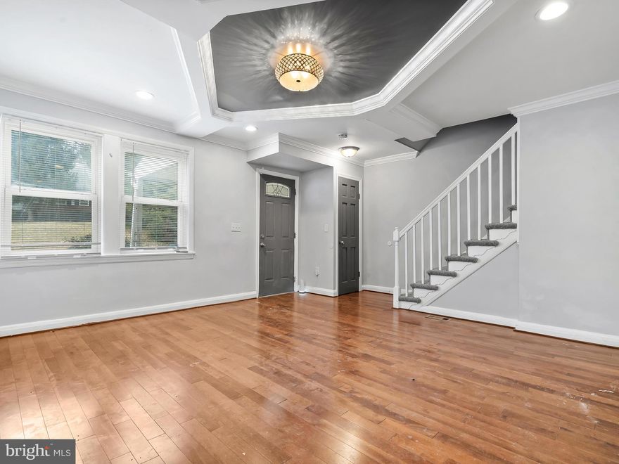 Beautiful new rehabbed townhome. New kitchen and baths, finished basement. Hardwood floors, granite countertops, stainless steel appliances, all new systems. This home has it all!!