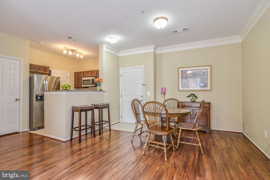 OPEN SUN 1-3Fabulous 1 BD Condo in the Heart of Tysons! Spacious Liv, Din & Updated Kit w new cabs,granite & SS Appl, Lg Bd w w/in closet. Private patio.Updates incl: new kit,new tile flrs, new laminate flrs, newer carpet, HVAC & Full size w/d. Amazing amenities incl pool,sauna,clubhouse,theatre & gym. Reserved space just outside unit. Short walk to Silver Line Metro & Min to Tysons,495,66,7 &123.