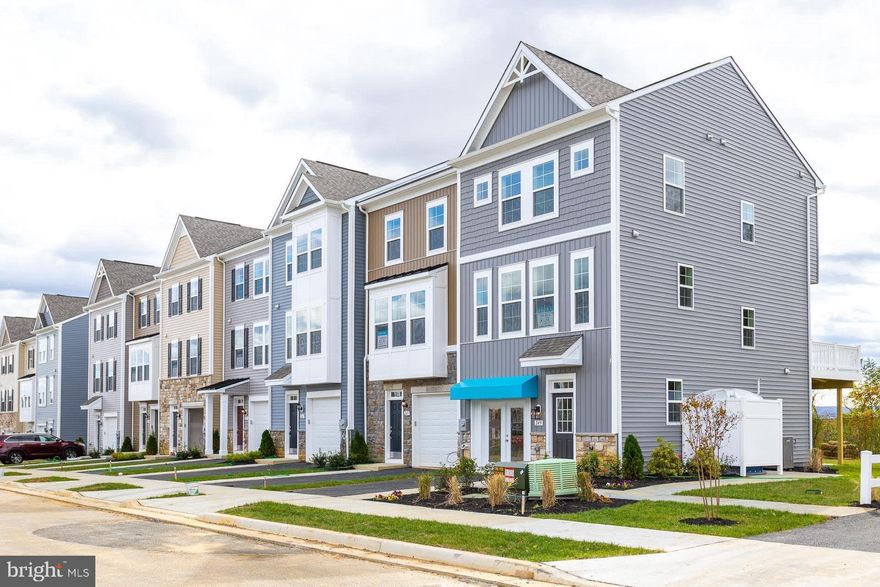 The only community within historic Charles Town with resort style amenities!
**Cover Your Closing Cost Up To $10,000, Paid by DRB Homes and Lender Credit for Primary Residence with Use Of Preferred Lender and Title!**
Brand New Construction Available in Jefferson County’s premier planned community. This 3 Bedroom, 3.5 Bath, 1 car garage townhome features a covered front porch, spacious foyer, and a double coat closet. Open concept oversized kitchen with a large island and opens to the morning room and living room. This home features our Alternate Main Floor Option, which truly creates an open concept from the front of the home to the back. The primary suite features a large walk-in closet, dual vanity, soaking tub and separate shower. Laundry is located on the bedroom level. The home is complete with a finished basement and a full bathroom.**Photos may not be of actual home. Photos may be of similar home/floorplan if home is under construction or if this is a base price listing.