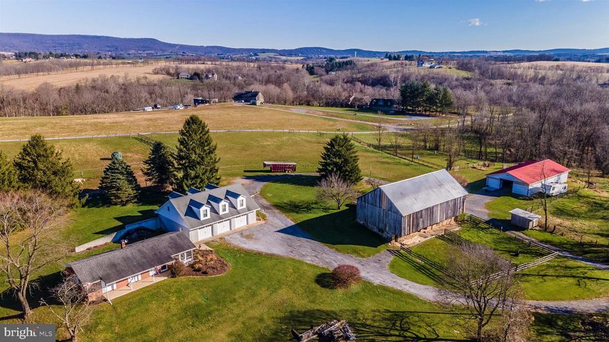 Everything you need for you and your horses can be found on this picturesque 37+ acre farm with mountain views. An easy-to-care for remodeled 3 bedroom, 2 bath home with one-level living, a practical, workmanlike 8-stall center aisle barn, a fabulous bank barn with four oversized stalls and plenty of room for hay and equipment up top. Multiple fenced pastures. A detached garage with large, bright finished space above with full bath and kitchen.  Did we mention trails? Middletown, Frederick County, Maryland, close enough to Washington, DC, but far enough away at the same time!  Interior photos coming soon after new paint is completed.