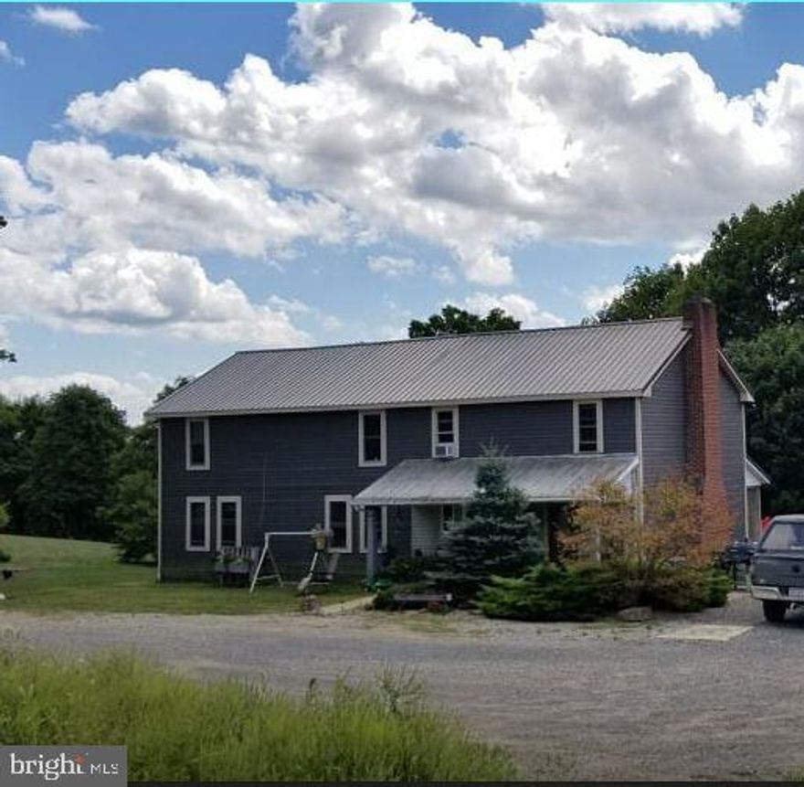 Greenwood Twp - Juniata County- Rural/secluded 4 bedroom, 2 full bath home features open floor plan, exposed wood beams in living room,1st floor bedroom & laundry. 2 fireplaces (stone & brick) Rear deck for enjoying sights and sounds of nature. Block barn 24'x90' with water & electric, pole shed 30'x48'. 40 minutes from Harrisburg.