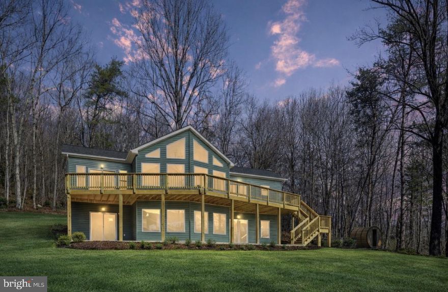Discover the perfect blend of privacy, beauty, and modern mountain living on this 2.5-acre wooded lot surrounded by mature trees and natural scenery. Tucked away from the hustle and bustle, this land offers a peaceful, park-like setting with the ideal balance of open space and forested charm — a true slice of the Shenandoah Valley.
The to-be-built chalet-style home features a thoughtful design with a main-level primary suite, 3 bedrooms, 2 full baths, and an unfinished walkout basement ready for future expansion. Soaring ceilings, large windows, and an open-concept layout bring the outdoors in, filling the home with light and showcasing the surrounding beauty.
Whether you’re looking for a full-time residence or a weekend retreat, this property provides the space, serenity, and scenic backdrop to create your dream mountain escape — all within easy reach of Front Royal, Skyline Drive, and the Shenandoah River.