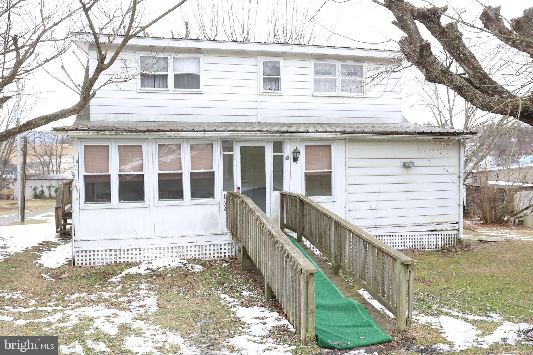 Welcome to your potential new home in the charming town of Lewistown, Pennsylvania! This spacious house offers 1800 square feet of living space, perfect for families or those who love entertaining. With four cozy bedrooms and two well-appointed bathrooms, there's plenty of room for everyone to stretch out and relax.
One of the standout features of this property is its renovation potential. Let your imagination run wild as you envision the possibilities of transforming this house into your dream home. Whether you're a DIY enthusiast or planning to hire professionals, this canvas is ready for your personal touch.
The generous lot size provides ample outdoor space for gardening, backyard barbecues, or simply lounging in the sun. And don't worry about parking woes – there's plenty of room for your vehicles, making coming and going a breeze.
Inside, enclosed porches offer additional living space and a perfect spot to enjoy your morning coffee or evening cocktail. The central air conditioning will keep you cool during those warm Pennsylvania summers, while ceiling fans add style and comfort.
Located in the friendly community of Strodes Mills, you'll be just a stone's throw away from local amenities and the vibrant atmosphere of Lewistown. Nearby Highland Park offers beautiful green spaces for outdoor recreation, and the charming town of Burnham is just a short drive away.
This property's attractive price point makes it an excellent opportunity for first-time homebuyers or those looking to downsize without sacrificing space. So why wait? Come see this gem and start imagining the possibilities of making it your own little slice of Pennsylvania paradise!