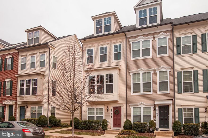 Beautiful 4 level end-unit townhouse in highly sought-after Gallery Park neighborhood.  Featuring 3  bedrooms and 2.5 baths with newer main level hardwood floors.  Stunning  gourmet kitchen with granite countertops, large island and stainless steel appliances. Lots of closets, windows and a balcony. Extra  storage  unit by the garage door.  Close to I-270, shopping centers & Clarksburg Premium Outlets, restaurants and walking distance to local Clarksburg schools.