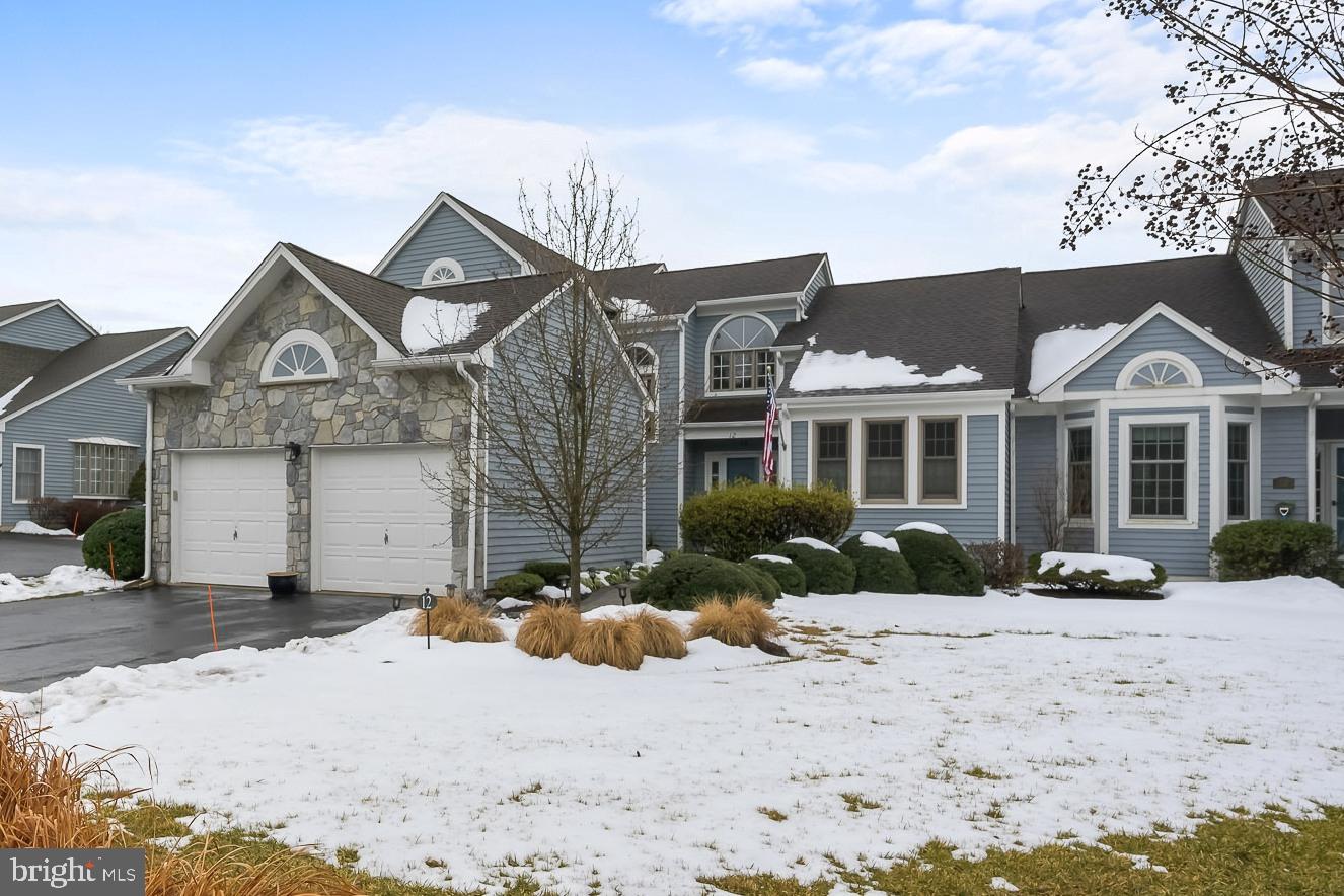 Situated in the lovely community of Somerset Lake, this inviting home exudes style, care and quality. Every area is presented in pristine condition, just move in and enjoy! The interior offers large rooms for entertaining and private alcoves to escape and reflect. The defining characteristics are the home's personal touches such as new hickory flooring, beautifully updated bathrooms, and glass doors and large windows that allow natural light to brighten rooms. As a gathering place for family and guests, the two-story living room is spacious and accommodating. A fireplace flanked by windows and look-over from second story loft area enhance the room. Open to the living and dining rooms, the updated eat-in kitchen features updated soft-close cabinets, Zodiac quartz countertops, center island, backsplash, and stainless steel appliances. Glass doors in the dining room lead to an expansive Trex deck with incredibly private views of the surrounding landscape. The owner’s suite, conveniently located on the main level, is sure to impress. This quiet retreat offers three generously sized closets and updated private bath with double vanity, corner soaking tub and separate tile shower. Upstairs, there is a loft area, two additional bedrooms, and a hall bath. Spaciousness abounds in this home as it also includes a main level laundry room, powder room, two-car garage, and an unfinished lower level with workshop with increased electrical and lighting. Extensive improvements include fresh paint throughout most of interior in 2021, updated kitchen cabinets in 2020, new Trex deck in 2017, new Hickory and tile flooring in 2017, new HVAC system in 2017, and all new windows replaced in phases between 2015 - 2019. *The community lake, pool, tennis courts, club house, playground and more are at your disposal in this wonderful resort community!