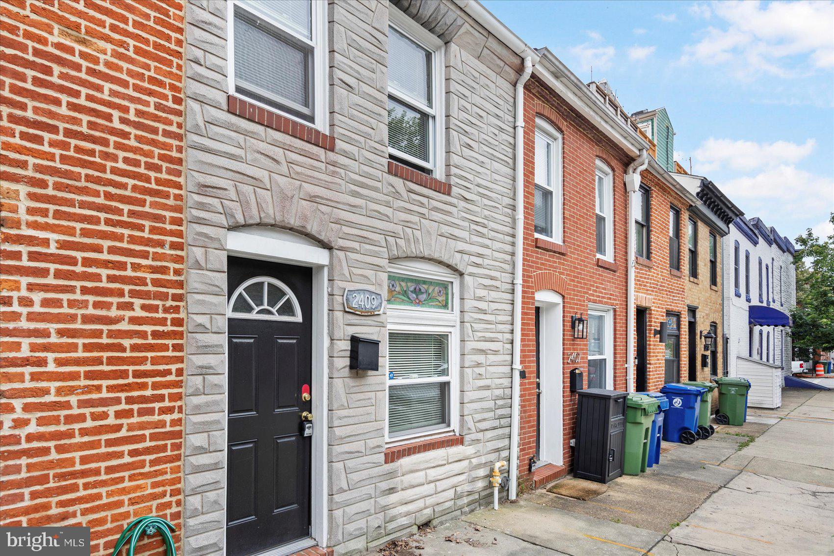 Move-in ready 2BR/2BA Townhome located on a tree-lined street in the quiet but bustling neighborhood of Canton. Make your way to the front door of your forever home and step into a home filled with original character featuring an exposed brick wall, an arched entryway, wide floor moldings, crown moldings, tons of natural light, a freshly painted interior, and hardwood floors. The main floor boasts a large living room, spacious dining room, a full bath, laundry, and a newer kitchen. The kitchen offers plenty of cabinets, stainless steel appliances, and granite countertops with subway tile backsplash. Tucked behind the kitchen is laundry and a full bath with a walk-in shower. The exposed brick wall carries onto the second floor featuring a spacious secondary bedroom, a larger primary bedroom with a walk-in closet and access to a spacious rooftop deck, and a full bath with a jetted soaking tub. Access to the yard and storage shed is from the main floor. This home is move-in ready with so much to offer new homeowners and is located in close proximity to shopping, restaurants, and commuter routes.