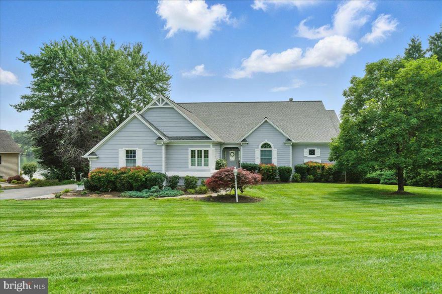 Tucked within the exclusive, gated community of Contentment Island, this impeccably maintained, furnished waterfront residence offers serenity on Smith Mountain Lake. Designed for ease & convenience, the home provides the option for one-level functionality & is perfectly situated on a rare, gently sloping lot with easy access to the dock. Inside, vaulted ceilings & expansive Anderson windows frame panoramic lake views from the living & dining rooms. A cozy den with a stone fireplace creates a warm, inviting space to relax or entertain. Two primary bedrooms are conveniently located on the main level—including one with a private lakefront balcony, perfect for peaceful evenings watching the sunset.

The lower level features a wet bar, bedroom with a large walk-in closet, full bath, & space for a potential 4th bedroom that could serve as a personal gym or home office. It's ideal for guests, extended stays, or a mother-in-law suite, offering comfort, privacy, & flexibility.

Notable features include a screened dining area, covered porch, expansive Trex deck, new HVAC system installed in January 2022, & ample storage throughout. All appliances & furnishings will convey with the home, excluding a few decorative items.

Residents of Contentment Island enjoy premier amenities including a clubhouse, swimming pool, tennis & pickleball courts, walking trails, & boat/trailer storage. Conveniently located with easy access to Roanoke, Lynchburg, & North Carolina, this is a rare opportunity to own in one of Smith Mountain Lake's most sought-after communities, where every detail contributes to a peaceful, elevated retreat.