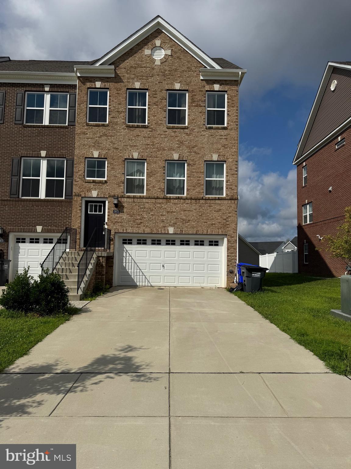 Welcome home to this beautifully, well kept oasis! This stunning End-Unit Brick Townhome will be ready for . Experience luxury living in this beautifully designed end-unit brick townhome. With 3 bedrooms, 3 full baths, and 1 half baths, this move-in-ready home combines comfort, style, and convenience in every detail. This home is filled with natural light and open space for you, your family and friends. Entertaining will be a delight as everyone is together, eating, laughing and enjoying each other in the same space without feeling crowded. The gourmet kitchen is designed with family in mind. With it's oversized island, stainless steel appliances, granite countertops, and a large pantry, connected to a dining area and the large family room, all must haves are checked. The large window and door of the dining area opens up to a full-size deck, to take in the fresh air or just relax. A half bath is conveniently located on this level as well.