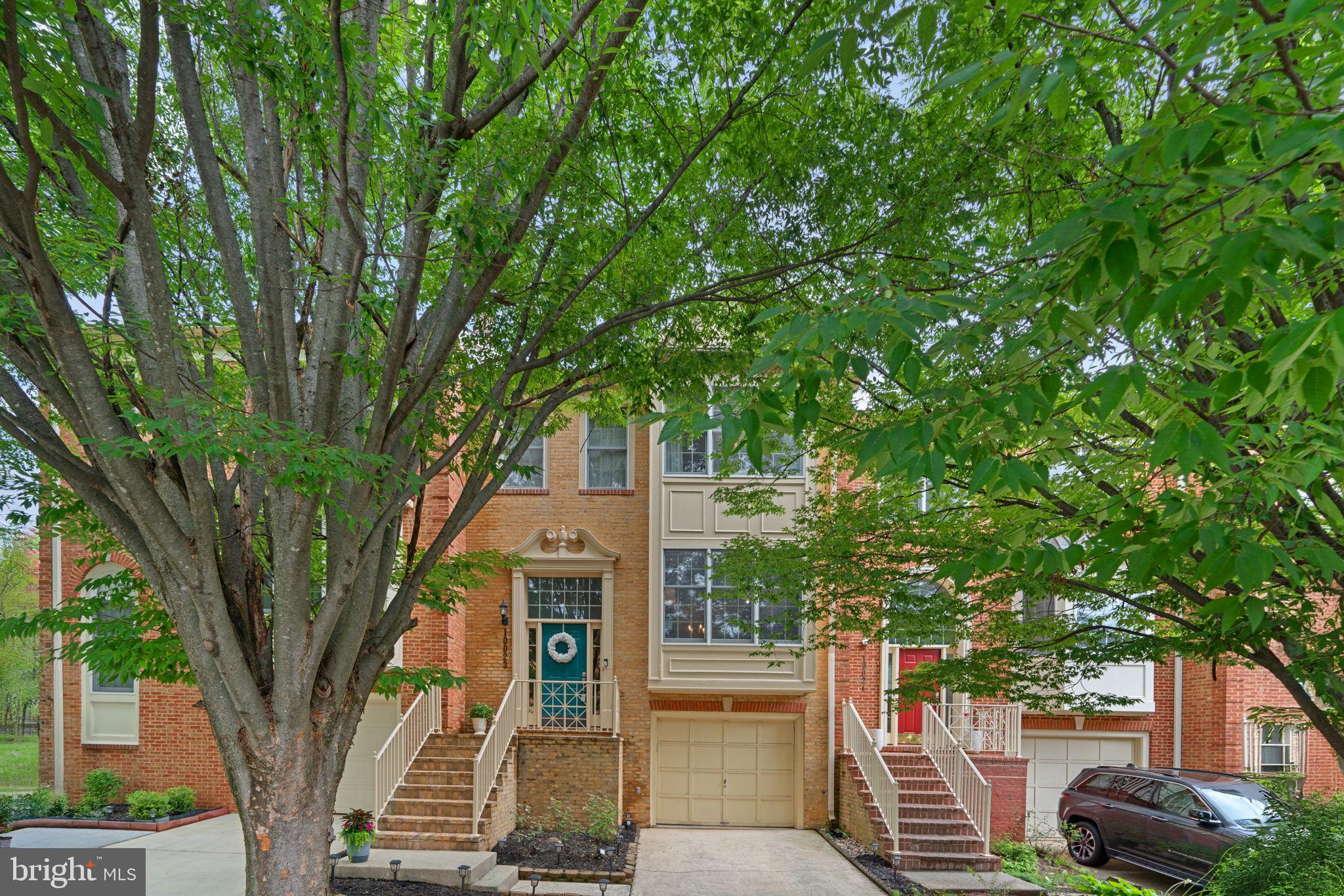 Welcome to 10023 Sterling Terrace, Rockville, Md. A beautifully maintained home offering the perfect blend of comfort, sophisticated style, and location. This brick, 3 bedroom, 2 full and 2 half bath residence features a fully finished basement with walk-out and a wet bar, ideal for casual entertaining or relaxing evenings at home. Recently upgraded primary bdr. bathroom delivers a spa-inspired feel with modern finishes. From the kitchen, step outside to a spacious deck perfect for gatherings or enjoying quiet time outdoors. A one car garage adds extra convenience and storage space. Residents enjoy access to a community pool, outdoor tennis courts, trash removal, and professionally maintained common grounds. Sei in a quiet pocket of Rockville, the home is just minutes from I-270, DC Metro, Downtown Crown, and Rio, offering unbeatable walkable access to upscale dining, shopping, and commuting while still enjoying a sense of retreat. Don't miss this move -in ready opportunity in an incredibly convenient location.