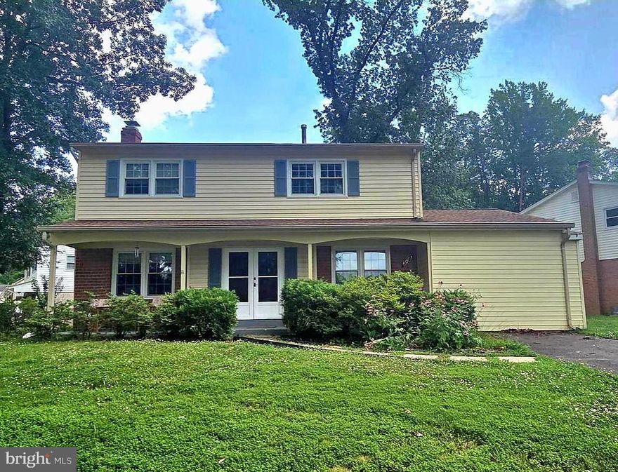 West Springfield Pyramid! Orange Hunt Elementary School  & Metro Bus F83.  This stunning Colonial home is located in one of the most desirable neighborhoods in West Springfield, close to highly-rated schools.  A Corner lot with NO HOA. The main level features a welcoming family room with a cozy fireplace and large windows on both sides, flooding the space with natural light. The spacious kitchen includes granite countertops, double wall ovens, and room for a breakfast table, and it opens to a deck that overlooks a beautifully private backyard. Adjacent to the kitchen is an additional Exercise Room equipped with a large hot tub and it's own full bath, ideal for a home gym. Beautiful hardwood flooring runs throughout the entire home—NO CARPET! Upstairs, you'll find four bright bedrooms and a hall bath featuring a convenient walk-in tub. The large basement offers a front sitting room, a full laundry room, ample storage space with potential to add even more living space to suit your needs. 1.4 mls to Giant Shopping center,