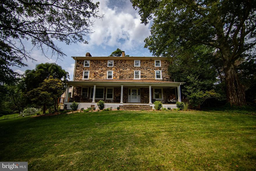 Welcome to 18th Century Sprucehaven Farm, on sprawling 7.2+/- acres in all its perennial glory. Most notably graced by its London Plane tree, the 6th largest in Pennsylvania. Construction of this stone coursed fieldstone Federal style estate, began c.1734. Owners demonstrate pride of ownership in their respect for its historical significance, coupled with effectively investing in quality upgrades and enduring enhancements to stand the test of time for years to come. Impressive Valleybrook entrance, a 315' long, flat setback befitting this stately property. Full length front porch. Charming center foyer fireplace & curved staircase. The hardwood floors throughout this home are magnificent. Authentic neutral colors on plaster walls w/ coordinating tones on woodwork & built-in cabinetry, deep sills throughout. Parlor living room to your right. A spacious Gathering Room to your left offering a generously sized wood fireplace, affords comfort for your entertaining. Formal dining room to the rear, leading to a large kitchen with updated quartz counters, stainless appliances, tile floor. Breakfast area with built ins & wood stove, plus an added ceiling fan, replaced skylight & rebuilt deck. Converted Four Season Sunroom with replaced energy efficient storm windows, tile flooring, propane stove, mounted mini-split heat pump, copper roof with interior wood accent ceiling, & 2023 Hunter Douglas 3/4 light filtering motorized duette shades with timer App! First floor Powder Room with stackable washer & dryer. All new storm doors. Storm windows have been replaced as well on the 1st & 2nd floors plus sliding doors (only) in eat in kitchen. Most roofs replaced including lower roofs on main house, office, barn, shed, & cistern. Second floor cozy & quaint En Suite BR/bath & added fireplace. Second En Suite BR & bath with bump out closet setting. Third bedroom & a thoroughly updated hall bath. The third floor has two generously sized bedrooms & a beautiful redesigned, rebuilt & repiped full bath. Bring your horses home for boarding and grazing, to a conversion of the bank barn into a 3 stall horse barn w/tack room & upper floor hay & feed storage. The approx 1/3 acre barnyard is intentionally outfitted with a special "dry lot" to prevent mud accumulation and erosion. Root cellar. Not one but two one acre (approx) pastures each with heavy duty no climb steel fencing with oak top boards and 4x4 post. Special pasture grass which grows early, faster, thicker, and deeper rooted. The Heather Lane entrance sports its own 3 car parking, & leads to a converted 1875 cow barn/carriage house, most recently upgraded as an approx. 1500 sq ft business office, with covered entrance, comfortable waiting room with powder room & two additional large rooms.  Might you need a separate au pair suite or in law quarters instead? With a little additional conversion, voila! Provisions to this building are propane heat & electric A/C, septic tie in, well tie in, modern electrical service & wiring, separately metered & insulated. There is a three car detached garage with storage. Plus additional storage shed. A once unused well has been tapped at the bottom of the cistern, installed pump & water lines to service both the horse barn and the office. Installed is a complete septic system which serves the house and the office. Care and attention given to driveways, walkways, patio, stone walls. Installed heat pumps & ductwork for whole house HVAC. Installed whole house water softening system. Installed new circuit breaker box, whole house surge protector & wiring to allow a generator to provide service to major house systems. Additional BSM hook up for washer and dryer. This lovely 7+ acre property is bordered by Chester Heights Community Park!  Convenient to shopping, dining, arts, medical needs. Also! Quick access to I-95, brand new Wawa Train Station, Airport, Philly, Wilmington and Shore Points. A perfect blend of yesterday, today and tomorrow awaits.