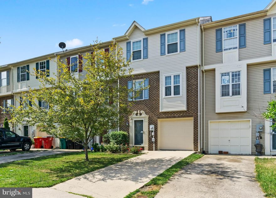 THIS TOWNHOME IS A GEM! An exceptional, single-owner property that has been meticulously maintained and updated. Spanning nearly 1800 sq ft, this pristine home features two spacious bedrooms, two full bathrooms, one half bathroom, a kitchen equipped with an island, Corian countertops, stainless steel appliances, a gas range, and a pantry. The dining area opens through sliding glass doors to a charming 12x18 Trex deck, that backs to trees and is equipped with a superb Sunset/Semico retractable awning operated by remote control. The lower level includes a cozy family room with a pellet stove, perfect for warm gatherings on chilly winter nights, with sliding glass doors leading out to a delightful privacy-fenced patio.  The upper level  has 2 large bedrooms and 2 full baths plus the laundry equipped with washer and dryer.  Flooring on the main and upper levels is luxury vinyl plank and laminate wood for easy maintenance.  The garage is finished with drywall and has built-in shelving for extra storage.  Many quality upgrades and updates including tilt-in replacement windows; new roof, new gas furnace & thermostat (installed in 2023), new garage door & opener, Trex deck, appliances, and upgraded toilets, sinks and faucets.  All upgrades are top-of-the line products.