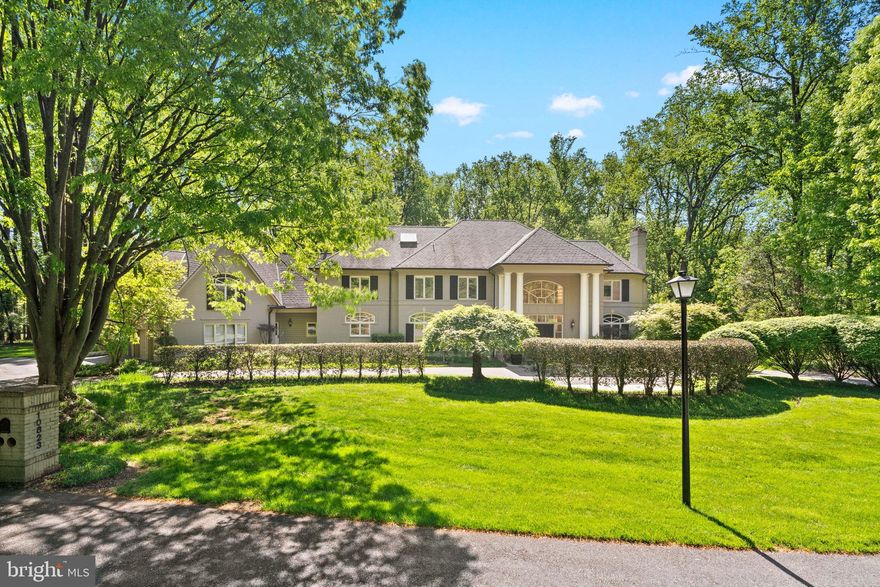 A true Potomac showpiece, this nearly 13,000 sq ft estate offers timeless grandeur on 2 private cul-de-sac acres in one of the area’s most exclusive enclaves—approached by a large circular driveway and grand entrance that set the tone from the start; beyond the double front doors, a soaring two-story foyer with a sweeping Iron staircase introduces a home designed for elegant living and grand-scale entertaining, featuring 8 bedrooms, 10 bathrooms, a 3-car garage, and an exceptional blend of formal and informal spaces; freshly painted throughout with a fully refreshed kitchen that shows like new, the chef’s space is equipped with dual islands, two full-size refrigerators, a walk-in pantry, and seamless flow to an expansive flagstone patio; the walk-out lower level has been completely transformed into a light-filled, private apartment-style retreat—featuring a full kitchen, 3 bedrooms, 3.5 baths, gym, laundry, and floor-to-ceiling windows throughout; outdoors, enjoy a true resort experience with a private tennis court, saltwater pool with spa, and multiple terraces for refined entertaining—all tucked within a private cul-de-sac near Bullis, making this one of the best values in Potomac for land, square footage, and amenities of this caliber.