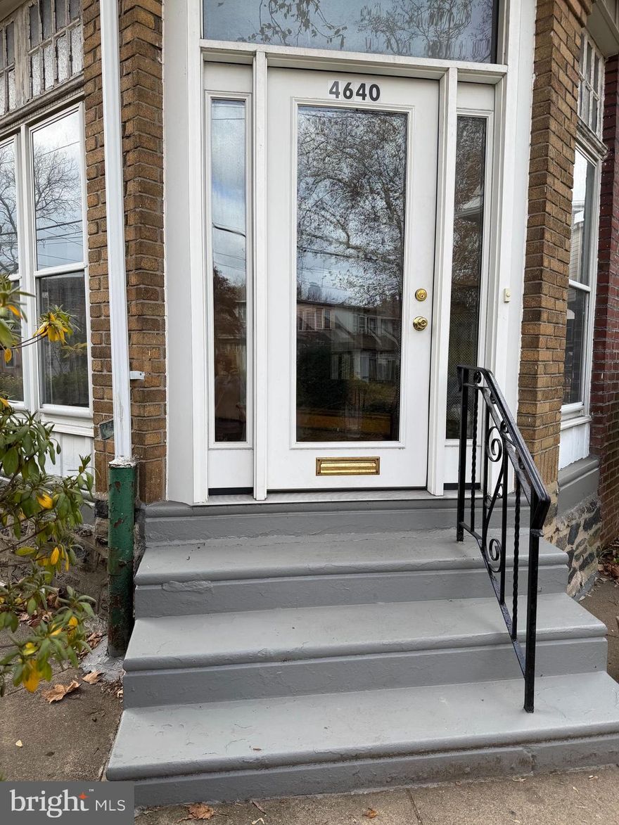 This classic Semi-detached house in Northeast Philadelphia is ready for a new Owner.  Entrance to the house brings you to a comfortable  enclosed porch surrounded by windows.  The first floor consists of Living Room with wood burning Fireplace, Dining Room and Kitchen.  Living Room and Dining Room have hardwood floors, Vinyl flooring is in the Kitchen.  The Kitchen has a Pantry, perfect for non-perishables and a Gas Range and there is an exit to the back  where there is a walk way to the garage area.  This home is in excellent shape and ready for new occupants.  The neighborhood is established with trees and plantings on this property and the adjacent homes as well.