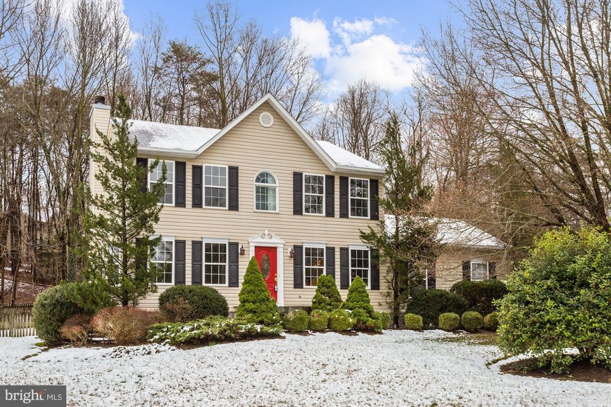 Absolutely beautiful, updated colonial on a private 2+ acre lot!  Freshly painted, new carpet & light fixtures, gleaming hardwoods & updated HVAC! Master suite w/ luxurious bath, finished lower level w/ family or theater room, wet bar & bonus room! Gorgeous landscaped lot backing to woods features paver patio & pond with waterfall. Just minutes to Annapolis & commuting routes to DC & Baltimore!