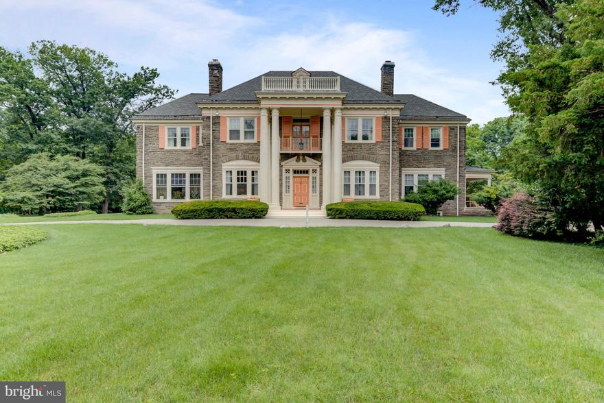 This elegantly appointed stone colonial estate is one of a kind and sits on a 2.73- acre private gated property with park-like grounds. This home is open, airy, dramatic and fabulous for living and entertaining with wonderful indoor and outdoor spaces. Beginning with the gated circular driveway and pulling up to the front entrance with Corinthian columns and a marble walk-thru center hall this home will not disappoint. Home highlights include 6-7 bedrooms, 4.3 baths, a dramatic foyer with marble flooring, crown molding, high ceilings a stunning staircase and great flow thru the main rooms. The bright and sunny living room features a wood burning fireplace with ornate mantle and marble surround. The large family room has handsome built-in bookcases, a wood burning fireplace and French doors that open to the back patio. The formal dining room, perfect for parties for a crowd as well as intimate dinners, has beautiful hardwood floors and an oversized bay window that overlooks the backyard. The small den is an ideal space for a first-floor office or a second family room. The kitchen adjoins a spacious breakfast room with side entrances to the driveway and side yard, Kitchen features include granite counters, double ovens, and a 5-burner gas cooktop and laundry area. A formal powder room completes the first floor. The second floor includes 4 spacious bedrooms, 3 full bathrooms plus a master suite that features a separate sitting area/dressing room and a master bathroom. The third floor has 2 bedrooms, incredible closet and storage space. The finished basement is perfect for a recreation room or gym, has a fireplace, plenty of storage space, a powder room and sauna. Beautiful patios and grounds create a wonderful setting for entertaining friends and family. A 3-car detached garage and private office with a separate entrance complete this magnificent estate. This home is located near the Chestnut Hill s wonderful shops and restaurants, Allen's Lane Park, Mount Airy train station, public transportation and is an easy commute to Center City.