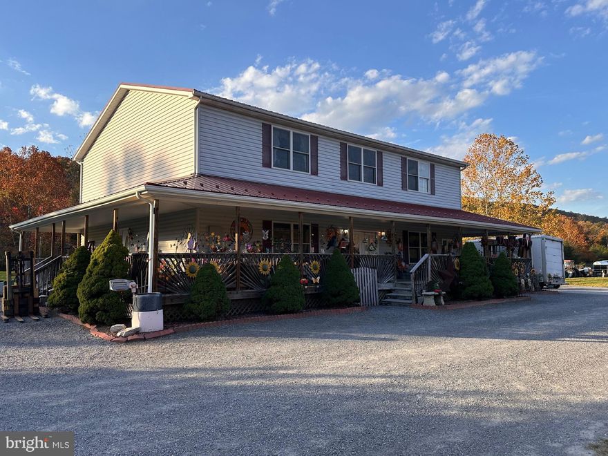 Terrific investment possibility with this property. Right off of 522 so the location is excellent for traffic. The property features a large showroom space with a large upper balcony space as well.It features a full basement for plenty of storage. This wonderful building has a large kitchen and two bathrooms for customers.  Many different businesses or possibilities on this one.