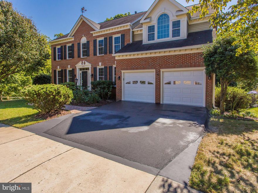 Conveniently located, Light & Bright 6 Bedroom 5 Bath Home. Enormous Master Suite with Fireplace. Main Level Bedroom with attached Bath. Gleaming Hardwood Floors, New Windows Throughout, 10  Ceilings, Spacious, Open Floorplan makes this a Great Home for Entertaining. Walk-Out from Renovated Kitchen & Breakfast Area to Deck. Bedroom, Full Bath and 2nd Kitchen in Lower Level with Walk-Out