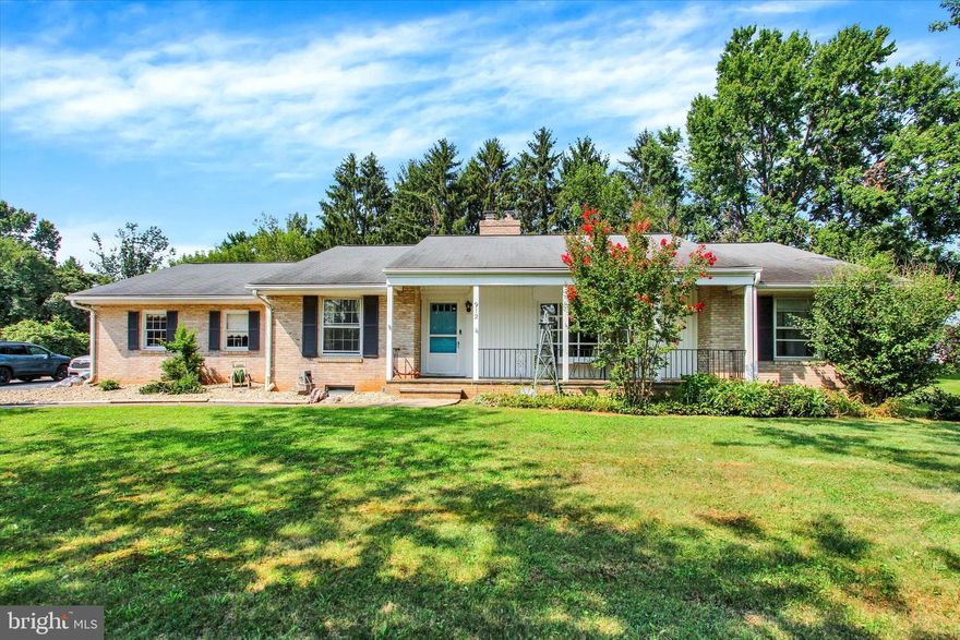 Nicely landscaped brick rancher convenient to town.  Main level offers 2 bedrooms, large  kitchen breakfast room, corian counters, separate laundry and lots of storage.  Formal living room, formal dining room large  family room with wood fireplace.   Primary bedroom offers full bath lots of closet space.  Second bedroom and hall bath finish the main level.  Lower level has complete  inlaw apartment with full kitchen , 2 bedrooms, full bath, additional half bath, gym (equipment included) huge workshop and a nice size family room with fireplace.   To enjoy the outside space there is a full front porch and rear patio.  Plenty of parking in driveway along with 2 car attached garage.  Basement is accessible from the rear walk up steps.   Easy to view. Possible assumption of VA mortgage!!