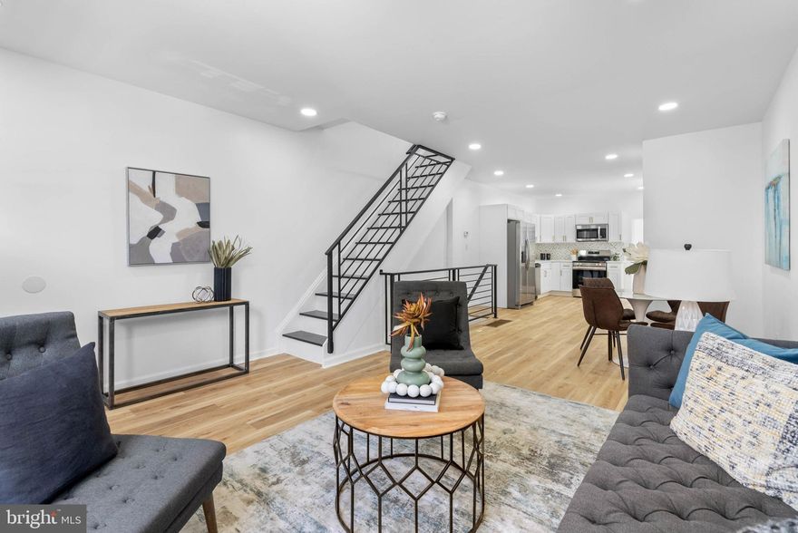 Welcome to 1837 N 28th Street, a beautifully renovated 3-bedroom, 2.5-bathroom townhome nestled in the heart of Brewerytown. This stylish residence offers almost 1500 square feet of thoughtfully designed living space, blending contemporary finishes with timeless charm.
Step inside to find an open-concept main level with gleaming new floors, recessed lighting, and a crisp white kitchen that boasts quartz countertops, brass hardware, designer tile backsplash, stainless steel Frigidaire appliances, and a striking gold-tone faucet. A main floor laundry area adds everyday convenience, while the finished basement provides valuable flexible living space—perfect for a media room, office, or guest area—along with a convenient half bath.
Upstairs, three bedrooms are complemented by two fully updated bathrooms featuring elegant tile work, brushed gold fixtures, and a modern aesthetic. Two stylish full bathrooms include elevated finishes such as sleek navy vanities with gold hardware and chic arched mirrors. One features a spa-like walk-in shower with marble-look porcelain tile, while the other offers a versatile tub/shower combo ideal for both quick rinses and relaxing soaks.
This home has been fully gut renovated with brand-new plumbing and electrical systems, ensuring peace of mind for years to come. Additional upgrades include brand-new central HVAC, a new water heater, and new energy-efficient windows throughout, providing comfort, efficiency, and a fresh start.
This home is move-in ready and ideal for those seeking sophisticated city living with easy access to Center City, Fairmount Park, and all of Brewerytown’s vibrant cafes, breweries, and green spaces. Don’t miss your chance to own this exceptional property in one of Philadelphia’s fastest-growing neighborhoods!