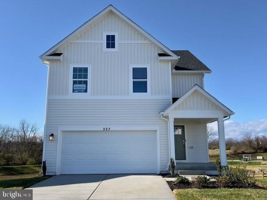 New construction move in ready! Welcome to Riverpointe, Charles Town's newest community! This beautiful two-story Pine Colonial offers 1,953 sq. ft. of well-designed living space with 4 bedrooms, 2.5 baths, and a 2-car garage.
The open-concept main level features a spacious family room, and a modern kitchen complete with stainless steel appliances, quartz countertops, and a large eating area—perfect for everyday living and entertaining.
Upstairs, the primary suite is filled with natural light and includes a walk-in closet plus a private bath with dual vanity. Three additional bedrooms provide plenty of space for family and guests.
The lower level, walk-out basement is partially finished with carpet ready for those loving sports. Make this your theatre tv room.  There is also a rough-in for future bath and egress window.  

Enjoy a fully sodded yard, ready for outdoor fun, along with a prime commuter-friendly location just minutes from Northern Virginia, Maryland, and DC. Restaurants, shopping, and parks are all nearby for added convenience.

With its thoughtful layout, stylish finishes, and move-in ready appeal, this home is waiting for you. Schedule your tour today!