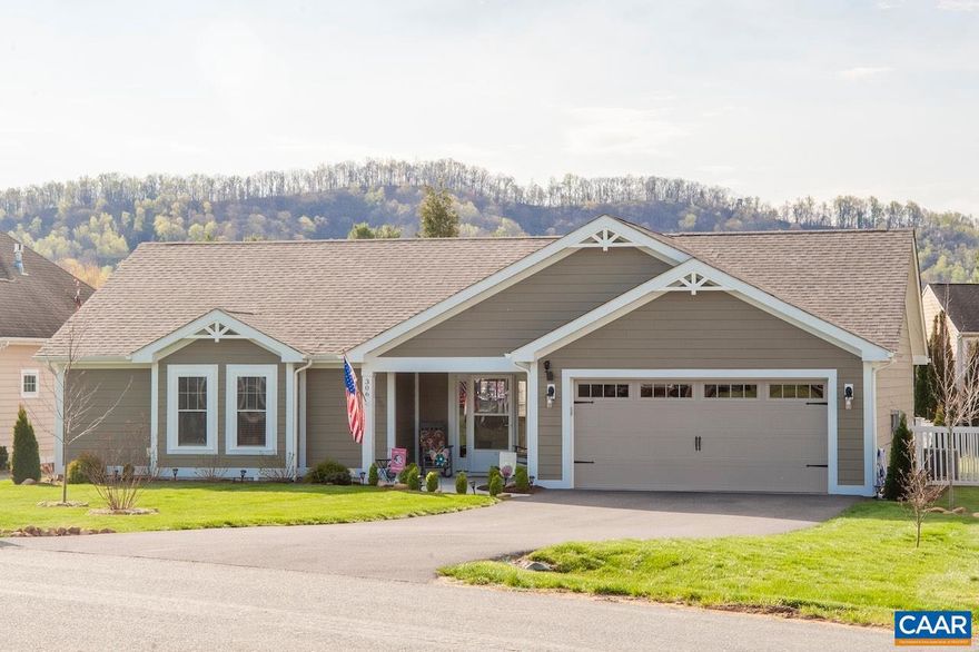 Rare opportunity to own a nearly-new home! Better than new because all of the finishing touches have been made to include a lush green lawn, landscaping with lighting, fenced back yard, and sunporch. Ideal one level living (stepless entry) to comfortably age in place and to also be able to pick up and go; work less and play more since the home has many low maintenance features (Hardie Plank siding with warranty) AND the yard is maintained by the community. Many extras: Vaulted ceilings, bright and open flow greatroom/kitchen/dining for easy entertaining, beautiful kitchen (wood cabinetry, breakfast bar, and granite countertops), primary suite (with walk-in closet and private bath with tiled shower), sunroom with mountain, pasture and backyard views (perfect for bird watching!), patio, covered front porch, two car garage with Tesla charger, paved drive, nearly level yard (borders Wintergreen open space in back for a more spacious feel), and fiberoptic internet. Short stroll to golf/clubhouse, farmers market, and Nellysford town hub with banking, doctor/dentist, grocery, and dining. Only minutes to Nelson 151 wine and brew trail and Wintergreen mountain for outdoor recreation; about 30 minutes to Charlottesville.,Granite Counter,Wood Cabinets,Fireplace in Great Room