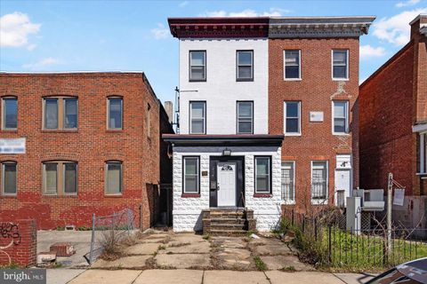 Photo of 204 E 25th Street, BALTIMORE, MD 21218 (MLS # MDBA2220844)