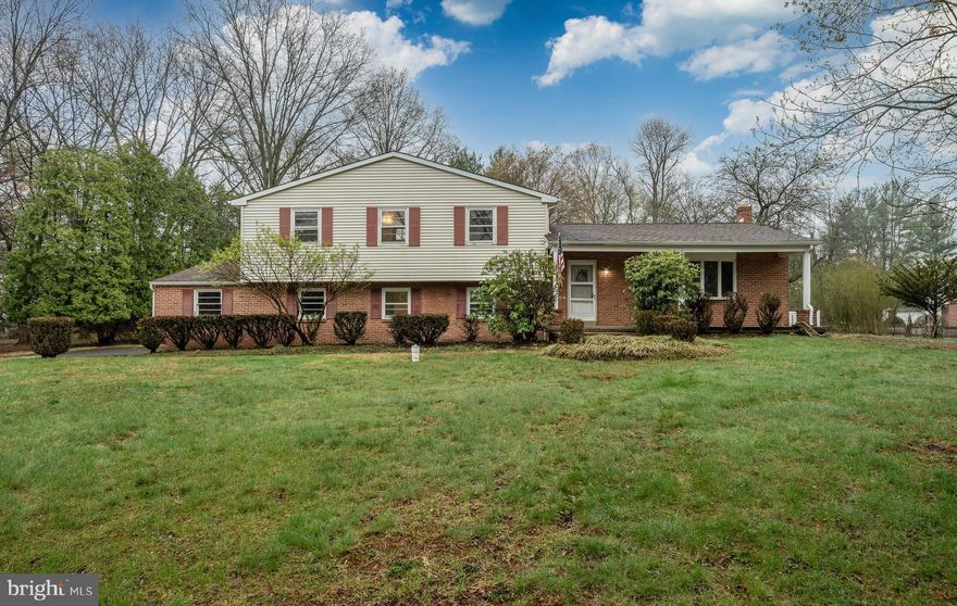 HIGHEST & BEST Deadline  Set for Monday April 14, 2025 at 6:00 PM.   Embark on the opportunity to renovate this spacious Split Level Home in the Woods of Pebble Hill in Doylestown Township Bucks County PA.  4 Bedroom,  2.5 Bathroom , 2 Car Garage,  unfinished basement sits on a beautiful corner lot of North Woods and Woodcrest Lanes with large mature trees lining the road.  Open yard space for games, picnics, gardens, and playgrounds.  Sylvan In-ground Pool with tier patio needs renovation but think tropical oasis to bring it back to life.  The entrance of the home has a welcoming front porch.   The interior of the home has a lot to offer with oak hardwood floors in the Living Room, Dining Room, and Bedrooms.  Master Bedroom currently has carpet and was expanded into 2nd bedroom to have a large master suite. This could easily be turned back into 2 bedrooms.  Primary Bathroom has vintage charm with white and lavender tile.  Full Hall Bathroom needs complete renovation.  The other 2 bedrooms have the hardwood floors ready to be refinished. Access to the attic crawl space is through the closet in the front bedroom to feature easy access for adding central air and more recessed lighting.  Bring your best design ideas to get your dream kitchen which flows into the dining room, and huge living room with bay window.  Dining Room  glass door is waiting for you to build that custom deck you've always wanted.  The lower level feature a large family room with brick fireplace and woodstove insert and rear exit to the fence in pool area, a room for a small office or guest space, as well as the half bathroom and laundry room with access to the garage.  This area of the home could be used to make an in-law suite. Unfinished Basement offers plenty of storage.  Here is your opportunity to customize a home to make your dreams a reality.  The home has been recently professional pressured washed and property clean up by landscapers.  Pool clean up will be performed April 12th.
