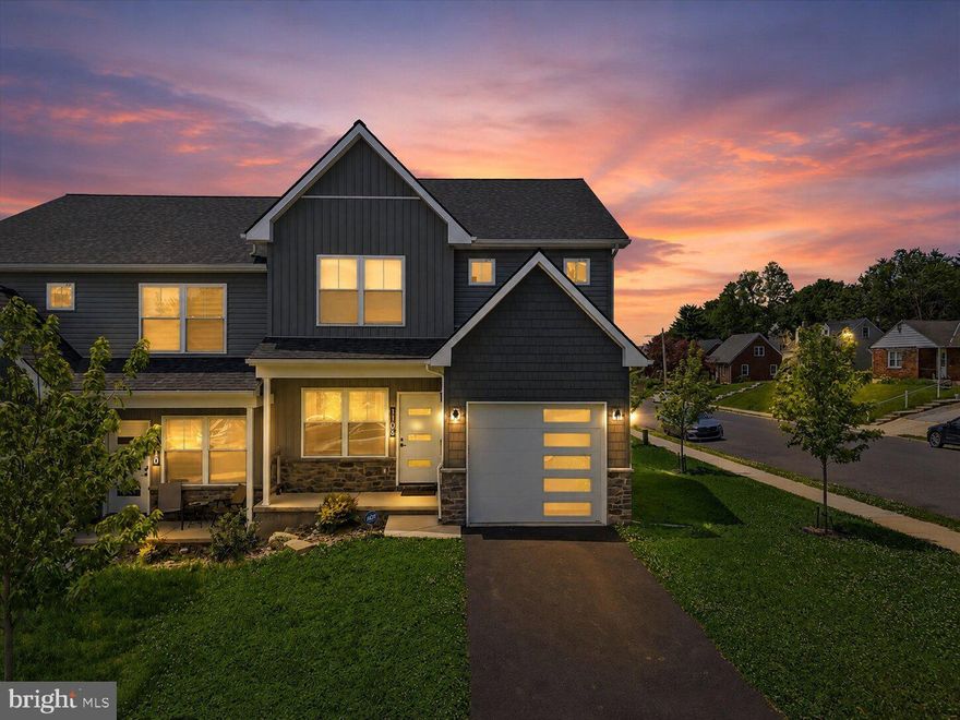 Why wait for new construction when this modern 2024-built twin is already finished, upgraded, and completely move-in ready? Positioned on a corner lot in Allentown’s South Side, 1106 S Carlisle Street combines contemporary design, flexible living space, and low-maintenance ownership with the added benefit of a professionally finished lower level completed in 2025. Inside, the open-concept main level was designed for both everyday living and entertaining, featuring luxury vinyl plank flooring, recessed lighting, oversized windows, and a striking kitchen centered around a large quartz island with pendant lighting, tile backsplash, pantry storage, and stainless steel appliances. Sliding glass doors off the dining area lead directly to the rear deck overlooking the surrounding hillside neighborhood. Upstairs, the home offers three spacious bedrooms, including a primary suite with a walk-in closet and private full bath, along with the convenience of a second-floor laundry room complete with utility sink. The finished lower level adds substantial additional living flexibility with space ideal for a recreation room, media lounge, gym, home office, or guest overflow setup, while multiple storage closets provide functionality rarely found in comparable homes. Additional highlights include central air, energy-efficient heat pump heating, attached garage, private driveway parking, modern black hardware and fixtures, and convenient access to major commuter routes, shopping, dining, parks, and downtown Allentown amenities.