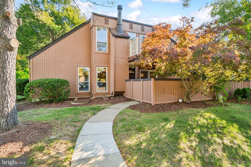 This end-unit townhouse features three spacious bedrooms, two full baths, wall-to-wall carpeting, and an L-shaped kitchen with room for a table. The main level includes a bedroom with plenty of shelves, a carpeted living room, and a dining area. A sliding glass door leads to the fenced-in front patio. The second level offers two bedrooms, a balcony, a full bath, and an oversized walk-in closet. Amenities include an Olympic-sized swimming pool, wading pool, tennis courts, and playground—convenient access to Ft Belvoir, bus stops, shops, Fairfax County Parkway, and schools.