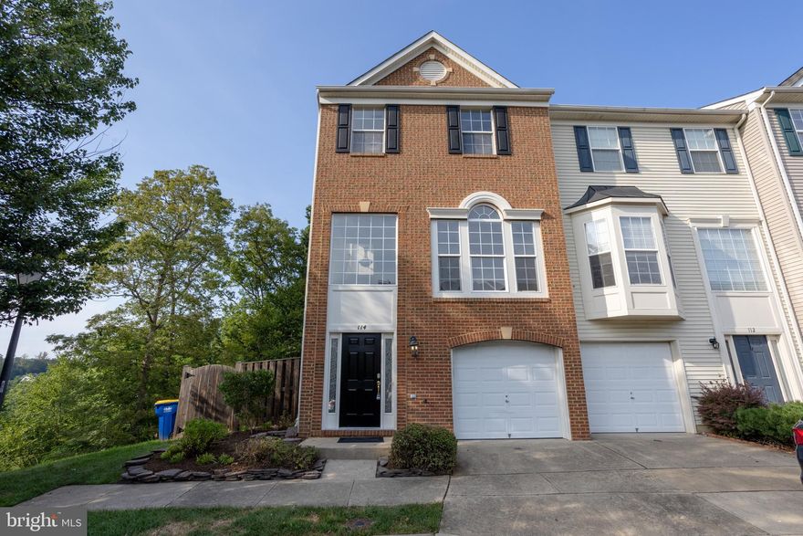 Spacious & Sunlit 3BR/3.5BA End-Unit Brick Townhome with Garage
Welcome home to this bright and beautifully maintained 3-bedroom, 3.5-bath end-unit brick townhome with a one-car garage, private driveway, and ample street parking. From the moment you step inside, you’ll know this is the one!
Gleaming hardwood floors span the entry and main living levels. The entry-level offers a versatile recreation room featuring a cozy gas fireplace, a built-in Murphy bed for guests, a full bathroom, and direct access to the fenced rear yard—perfect for relaxing or entertaining.
Upstairs, the sun-filled living room boasts large windows with expansive views, while the open-concept kitchen is a chef’s dream with stainless steel appliances, a gas cooktop, double wall ovens, and generous counter space. Step out onto the oversized deck—ideal for dining al fresco or gathering with friends.
Upstairs, the carpeted bedroom level includes a spacious primary suite with vaulted ceilings, a ceiling fan, and a luxurious en-suite bath featuring a double vanity, soaking tub, and separate shower. Two additional well-sized bedrooms, each with ceiling fans, share a full hall bath. Bonus: laundry is conveniently located on the bedroom level.

Recent Updates & Improvements:
2025: Full interior paint throughout the home
2025: House and deck professionally power washed
2025: Installed new Rheem 50-gallon gas water heater
May 2025: HVAC service – new condenser fan motor, dual run capacitor, and 2.5 lbs of Freon added to outdoor unit
November 2024: Deck treated with solid coat stain

Extra Perks: The HOA maintains the front and side yards—leaving you responsible only for the fenced backyard. Enjoy low-maintenance living in a well-cared-for community.

Just minutes from Stafford Marketplace, commuter routes via I‑95, and Quantico VRE station ( 6 mi), this home is both ideal for commuters and for families. Don’t let this one slip away—schedule your tour today!