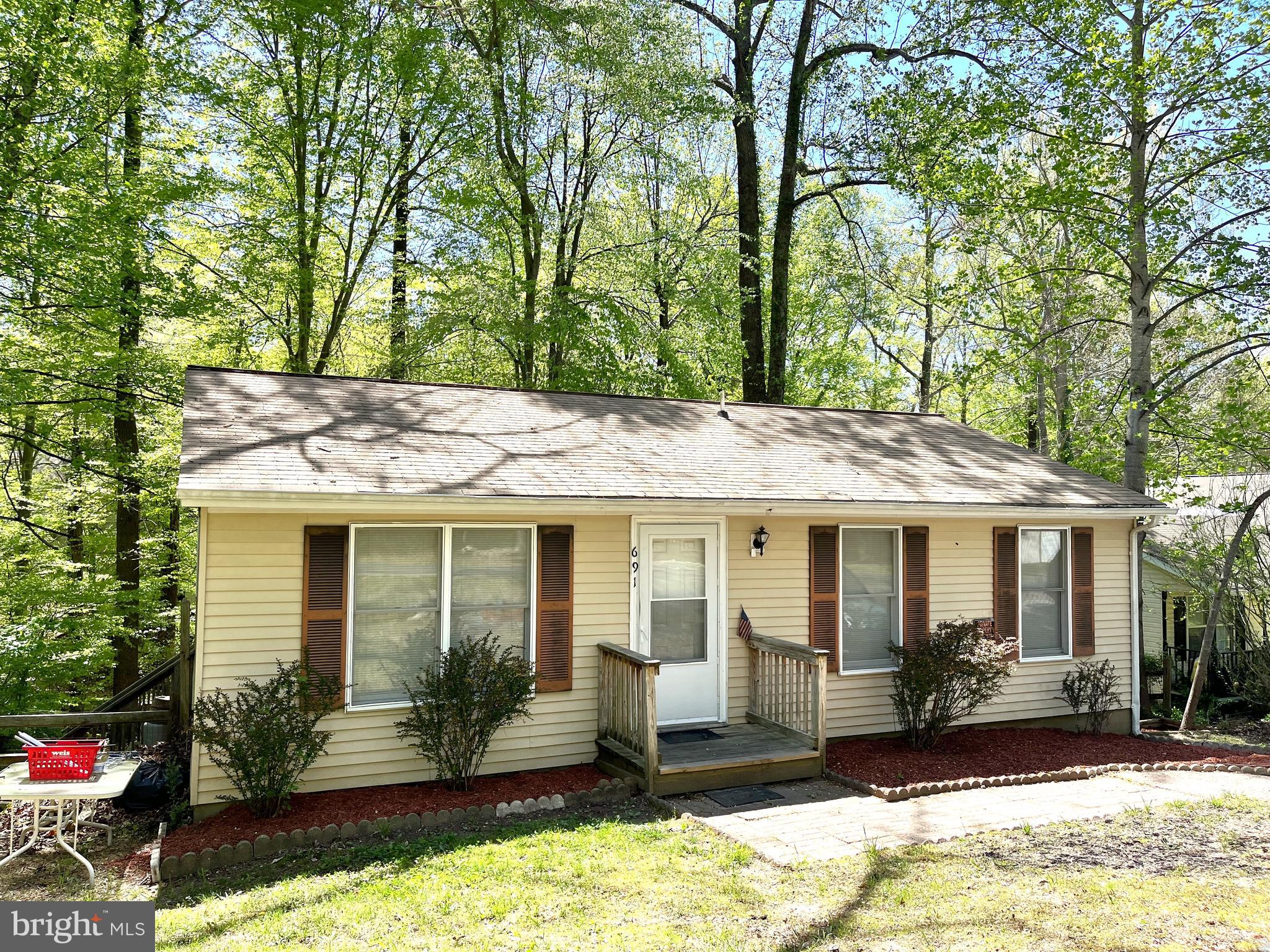 INVESTOR ALERT! House is currently rented for $1600/mo. Lease expires 6/30/2023. Tenant's rent is paid 100% by Calvert County. New LVT flooring in kitchen, new front door & sliding glass door in rear! Smooth top electric stove, refrigerator & dishwasher! Heat Pump replaced in 2014! Bath was completely redone with new tub, vanity & flooring in 2012! Deck overlooks partially fenced back yard! Located on paved road in CRE! This home would be available for settlement July 1st for owner occupants. Owner is a real estate licensee.