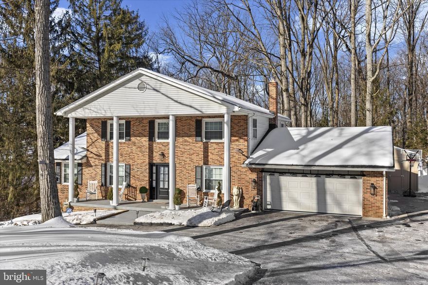 Welcome to 4009 Robinwood Drive in the desirable Sherwood Forest Community. This 3 bedroom, two full and 2 half bath home with an oversized 2 car garage, offers a functional layout with many updates throughout. Recently installed vinyl plank flooring and stainless-steel appliances complement the main living spaces, while the updated bathrooms provide a modern, refreshed feel. The partially finished walkout basement adds flexible space for a home office, gym, or additional living area and storage. Enjoy access to the outdoors from the covered deck off the family room, overlooking a wooded backdrop that offers privacy and a peaceful setting. Located in an established, quiet neighborhood, this home combines comfort, updates, and a natural setting just minutes from everyday conveniences.  Bonus features include an expanded driveway for additional parking for cars, a boat or camper, new shed,  greenhouse, extensive updates to the lower level finished areas and R34 insulated to increase home efficiency!!