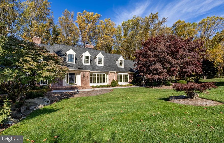 "Brookfield"  Brick  Cape Cod  Situated on a 3.9 acre lot.   Enter into the 2 Story Foyer with Marble Floor  - Traditional Living & Dining Room with Hardwood Floors, Bay  Windows,  Wood Burning Fireplace - Beautiful Detailed Moldings Throughout  -  Spacious Eat-in Kitchen  with SS Appliances, Center Island and Breakfast Nook - French Doors lead out to a Screen Porch and Deck - Mudroom/Laundry recently Remodeled  w/Powder Room & Back Staircase - 2 Story Family Room with an all Brick  Fireplace, Hook-up for a Wet Bar & Access to the Deck  - Handsome Den with Fireplace & Custom Built-ins - Main Level Primary  Bedroom with Vaulted Ceiling, Tons of Natural Light and a Newly Redesigned Bath -  2nd Level Consist of 3 Additional Bedrooms , 2 Baths  & Open area -  Lower Level  is set up with 1 to  2 Bedrooms, 
Living Area, Kitchenette, Full Bath & Laundry -  Large  Unfinished Utility  Room - 3 Car Garage - Mature Landscaping - Peaceful Neighborhood - Minutes to Restaurants & Shopping  - Welcome Home!