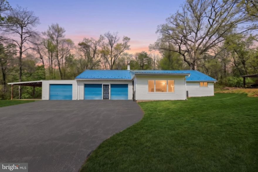 Welcome to 219 Butter Road in Northeastern School District! Sitting on a tranquil 1.8 acre lot you have a rare opportunity for private country living — hard to find in this price range!! This rancher offers 3 beds 1 bath and a bonus finished room in one of the garages (perfect for an office, home gym or a separate hang out space) plus an attached 2 car garage with additional storage space. Inside you have a large eat in kitchen, spacious living room and first floor laundry. The home has had many cosmetic updates over the last few years including painting and flooring throughout. Larger upgrades include the new metal roof, water well, hot water heater and furnace! Outside you have a covered patio off the side of house and a separate large covered outdoor pavilion. Schedule your tour today before this country cutie is gone!