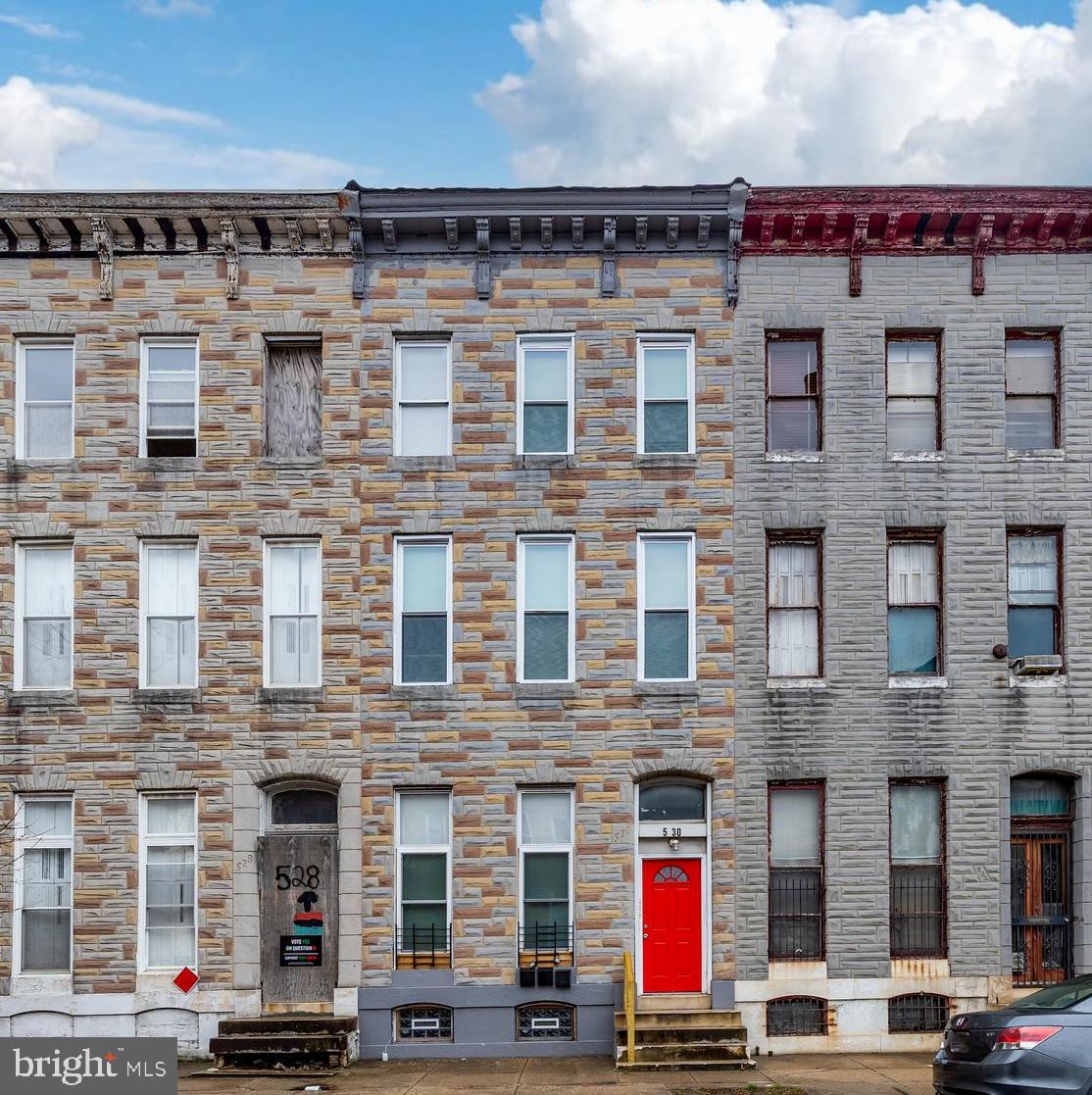 Investment Opportunity. This spacious, three unit property is located in the Harlem Park neighborhood. Each unit is on its own floor and have been updated to include: recessed lighting, new flooring, updated bathrooms and updated kitchen. The first floor unit includes two bedrooms, a full bath, kitchen, bonus room that leads to a fenced in patio. The second floor unit includes two bedrooms, one full bath, kitchen, and a den/living room. The third floor unit includes two bedrooms, a full bath, and spacious eat in kitchen. BGE has installed the electrical meters so each unit is metered separately. Building also has a fire escape. Good cash flow potential. All units are currently vacant. Close proximity to the West Baltimore Marc Train station and everything Downtown Baltimore has to offer. Property is sold strictly As-Is. Seller will not make repairs. Buyer is responsible for obtaining Use and Occupancy permit. Property is a short sale and professional short sale negotiator is working with the sellers. Buyer to pay short sale fee of $4,000.00 or 1.5% of the sales price, whichever is greater, upon closing.
