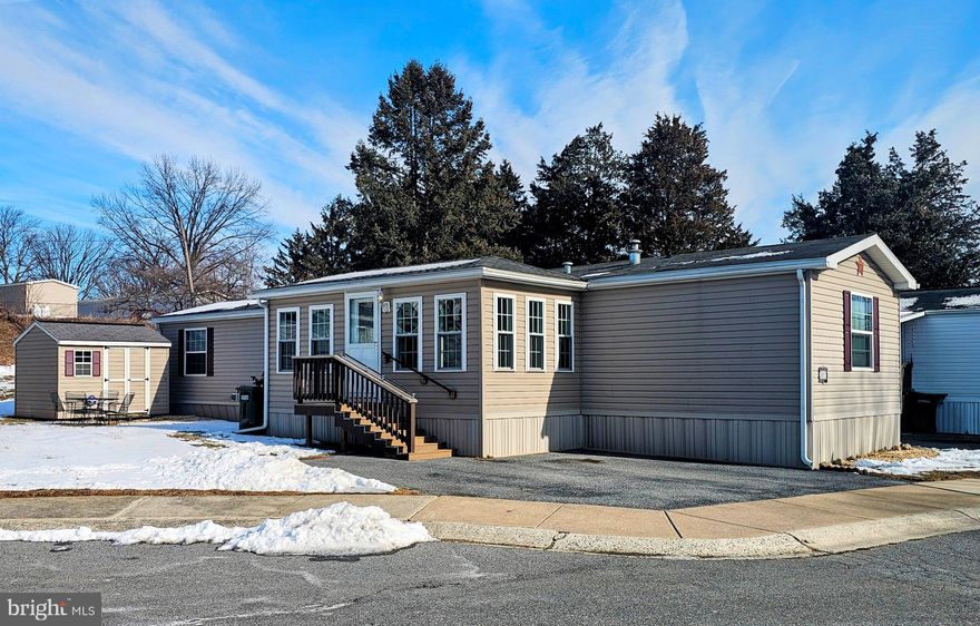 Well maintained home located in the desirable Plowfield Community offering 2 bedrooms and 1.5 baths. A heated sunroom addition welcomes you at the entry and leads into an open-concept layout. The spacious living room flows into the kitchen, which features ample cabinet and countertop space and comfortably accommodates a dining table. Both bedrooms are generously sized with closets, and the home offers well-appointed bathrooms throughout. Lot rent is $450/month and is included in the HOA fee. Park approval is required—please obtain approval prior to or with offer submission. Home must be owner-occupied. There is a $50 application fee per applicant, and all adults residing in the home must be included on the application.