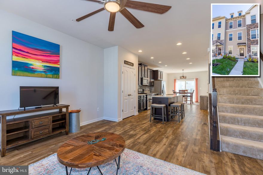 BEAUTIFULLY DESIGNED TOWNHOME LOCATED IN THE DESIRABLE TANYARD COVE COMMUNITY!  Features include an entry level bedroom w/ a full bath and large family room, main level with an open floor plan, laminate wood floors, spacious living room, designer island kitchen w/ ss appliances, separate dining area, half bath, and a rear deck.  The 3rd level offers 2 bedrooms and 2 full baths including a primary bedroom suite featuring a vaulted ceiling, 2 closets, and a spa bath w/ double sink, separate shower, and a separate tub.  This community has unsurpassed amenities including a club house, community pool, bike/walk paths, fitness center, a community dock/pier & free use of 2 paddle boards.  Conveniently located close to BWI, Ft. Meade, and major roadways.  MUST HAVE GOOD CREDIT!