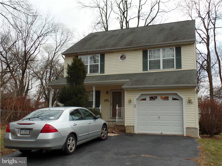 Beautiful 19 yr old 4 BR, 2 1/2 bath colonial with fully finished basement.  Fabulous Family Room was built over extended basement.  Gorgeous hardwood floors through-out first floor. (Family Room has carpeting).  Spacious Living Room and formal dining room.  Beautiful large kitchen with breakfast area opens into sunken family room.  New stainless steel stove, microwave, dishwasher and new counter tops.  Family room has sliding door to deck.  First floor powder room.  Master Bedroom with tray ceiling and master bath.  3 additional spacious bedrooms and hall bath.  French door to Basement, totally finished by Builder into large rec room area and a separate bonus area (under family room)  Lower level laundry room. To keep basement dry, Builder, George Popper, put Tar damp waterproofing on exterior foundation below grade.  New A/C and heater - just 3 years old.  Newer deck overlooking spacious rear yard.  Grounds are almost 1/2 acre with long 9 ft wide driveway from the street to this rear lot. Grounds are perfect for playing games and summer entertaining.  Neighbor has easement to use driveway and shares responsibility.  NO SHOWINGS ON FRIDAY AND SATURDAY, FEBRUARY 6TH AND 7TH.