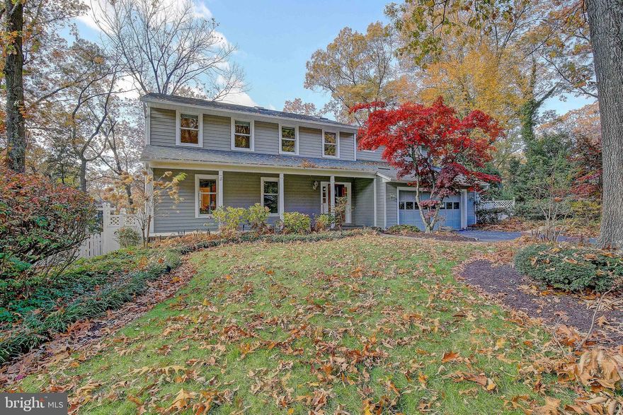 You aren’t just choosing a home; you’re choosing a lifestyle.  Located in the sought-after, amenity-rich Severna Park neighborhood of Berrywood, this 4400 sq ft Waterfront Oasis is complete with a full-sized waterside Volleyball Court with lighting and speakers, pier complex with docking for 5 boats and a power lift, 5 foot mean low water, extensive decking with a built-in hot tub and outdoor shower, lovely landscaping and beautiful sunset views of Cattail Creek.   The main level is all freshly painted with original hardwoods covering the floors. Front living room with built-ins leads to the formal dining room, then into the white kitchen, which is open to the family room with gorgeous stacked stone fireplace, built-ins, crown and wide floor mouldings.  Glass enclosed porch off the kitchen overlooks the volleyball court and the water. Upstairs you’ll also find original hardwood flooring and fresh, neutral paint in the hallway.  The Primary Suite features a wall of windows with an amazing water view along the back of the home, skylights, dressing area and full bath with garden tub and dual sinks.  Three other large bedrooms and the laundry room are located on the upper level. The finished basement is full of custom woodwork including the wet bar, walkout to the backyard, and covered patio area. Every day living here is going to feel like a vacation.  You’re going to love living here!