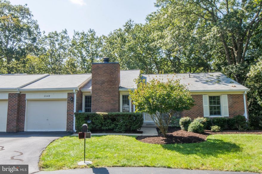 Wonderful villa in sought after Heritage Harbour Retirement Community. Single floor living convenience close to all Annapolis has to offer.  Large kitchen and living/dining combination with fireplace. This home backs to trees which makes for a gorgeous view year round and offers a lot of privacy. This villa has a great layout and is ready for your designing touches .  Roof is approximately 5 years old. Windows, HVAC, Water Heater are not original - newer. The wooded, serene setting makes the  deck and back screened porch a private oasis, perfect for watching nature or reading a great book. Lower level is finished and has a full bathroom.  Community amenities are fantastic for an active lifestyle. Community has golf, tennis, swimming and many groups of varied interests, there is something for everyone! One time recreational move in fee of $2,055.  55+ community. The condo fee includes the HOA fee.  For 360 degree views, click the movie camera icon. 12 Tours are available.