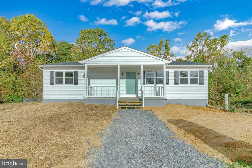 Brand New Custom 3 Bedroom 2 Bathroom Rambler in Prince Frederick! It will be hard to find another home at this price that provides these finishes! Enjoy the benefits of a newly constructed home with custom features! Whole house upgrades include recessed lighting, custom craftsman trim & 5 panel doors, laminate flooring throughout, pressure treated deck and architectural roof shingles. Kitchen upgrades include carrera marble countertops, painted white cabinets w/ black hardware, custom kitchen faucet & farm sink, stainless appliances w/ slide in range, tile backsplash & floating shelving! Bathroom upgrades include tile flooring & shower walls, custom vanities, black fixtures, and custom mirrors! Don't forget to check out the custom double barn door in the master bedroom!