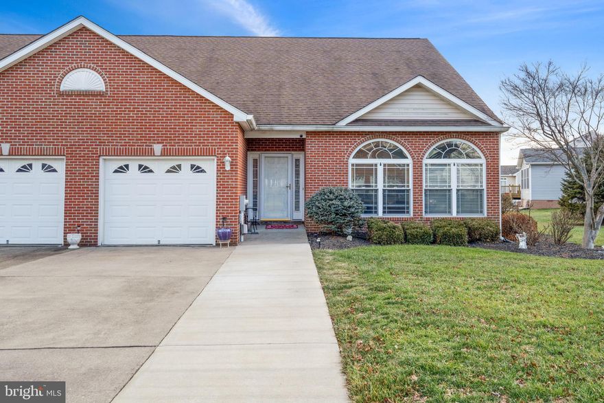 Photos Coming Soon! Welcome to this well-maintained brick-front rancher, offering comfort and convenience in a prime golf course setting. This home features a thoughtfully landscaped exterior and a spacious 30x12 non-slip deck with awning, perfect for outdoor entertaining. The fenced backyard provides privacy and plenty of room to enjoy the peaceful views.

Inside, you’ll find gleaming hardwood floors throughout, a propane fireplace, and a vaulted ceiling with recessed lighting in the expansive living room. Both large bedrooms include French doors that open to the rear deck, creating a seamless indoor-outdoor flow.

Primary suite with a walk-in shower and generous walk-in closet

Second bedroom with full bath, tub, and shower

Convenient half bath off the living room plus dedicated laundry area

Additional updates include a 50-year architectural shingle roof (2020), oversized gutters and downspouts, and classic curb appeal with its brick front.

This home combines single-level living with modern updates and a desirable golf course location—ready for you to move in and enjoy.