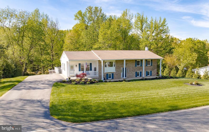 Northern Calvert County! No HOA!
This beautifully maintained and thoughtfully updated home is move-in ready and full of charm—located in desirable Dunkirk in north Calvert County. From the moment you arrive, you’ll notice the meticulous landscaping and lush lawn that frame this stunning property, both front and back. Huge newly paved driveway for plenty of parking space as well. 

As you enter the home through the easy access bonus room, you'll find a perfect space to hang coats and kick off shoes. It also doubles as a convenient play area, mudroom, or home office. Just off this space is the laundry area, leading into the gorgeous, fully renovated kitchen (2019) featuring granite countertops, a beautiful island, great lighting and a sunny eat-in dining space—ideal for everyday meals and gatherings.

The main level also offers a spacious family room filled with natural light from a nearly new bay window, making it a cozy and inviting place to relax. Down the hall are three well-sized bedrooms and two full baths, both stylishly updated in 2019.

But there’s more! Head downstairs to the fully finished lower level, where you'll find a second large living area complete with a full bar and propane fireplace—a fantastic space for entertaining guests or movie nights. There's also a fourth bedroom, a third full bathroom, and a separate storage room perfect for seasonal items and more.

Enjoy easy access to the backyard from either the kitchen, which opens onto the upper-level deck, or from the lower-level living space, which leads out to a stunning paver patio complete with a firepit and retaining wall—perfect for outdoor entertaining, day or night! The gorgeous backyard is surrounded by trees, offering privacy and beautiful views year-round. 

Too many updates to mention - Full kitchen remodel 2019, New HVAC 2024, Bathrooms updated 2019, New lower level flooring 2021, New Well Pump 2014, sprinkler system and more! Don't miss out! Call today for more information and to schedule a showing!