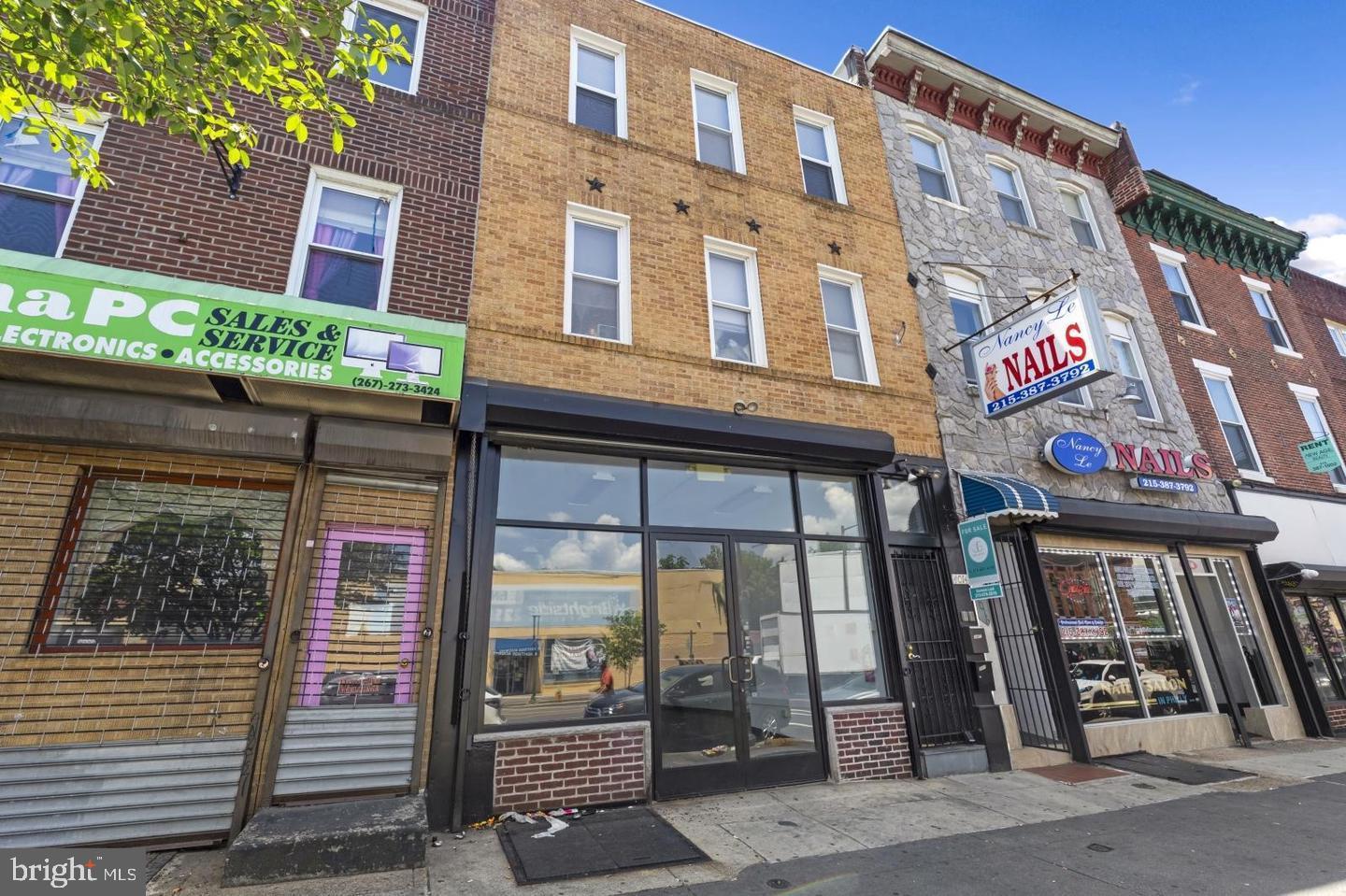 Welcome to 4014 Market Street! This mixed-use building is conveniently located between West Powelton and University City with easy access to 76, the 40th Street subway station, and services for multiple bus routes. The exterior has been updated with black framed windows spanning the entire commercial unit and beautiful brick on the top two floors. First floor is a light filled commercial space updated with newer flooring throughout, currently being used as a daycare. The commercial space has access to a large unfinished basement that is perfect for storage. Upstairs you'll find two well-sized residential units, which are both tenant-occupied. These units have ample storage, receive great natural light, private laundry, and large bedrooms. Be in the heart of all this area has to offer: neighborhood eateries like Louie Louie, El Taco, and Dim Sum House, the Philadelphia Zoo, the Please Touch Museum, and so much more. Don't miss out and schedule your tour today!
