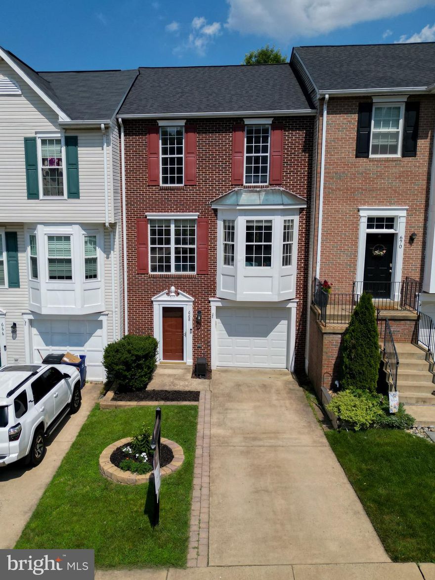 Rarely does a townhouse with 3 bedrooms and 2 full bathroom & laundry room on the upper level come available in the highly desirable Kincaid Forest community. Inside is a perfect blend of classic charm and modern updates. Featuring a light-filled, open-concept layout,  this nearly 1,800 sq ft of finished updated townhome boasts a sunny Kitchen, feel like a Chef,  with the large island for everyday living and entertaining, stainless steel appliances,  granite countertops, soft close cabinet drawers, recessed lighting and it's own pantry, a breakfast nook with bay window makes this area feel very open. The Main Level also features a half bath, recessed lighting throughout,  and French doors to deck . The upper level has the large primary bedroom  with an updated primary bathroom and large closet space, the bedroom level laundry room has lots of storage rack space, a Full Hall bathroom and 2 additional ample size bedrooms.  Lower level can be used as a 4th bedroom or recreation room and has a gas fireplace and 1/2 bathroom, as well as an egress French door to fenced backyard with patio.  Enjoy seamless indoor-outdoor living with a large private deck—perfect for relaxing or hosting guests. Don’t miss this rare opportunity to own a stylish and comfortable home in a well-established community.  Close to so many stores, restaurants, medical facilities, W&OD trail, parks and walk-able to the community pool! And lots of VISITOR PARKING! Updates Include: Roof: 2020, Kitchen and Baths: 2018, Deck: 2017, HVAC: 2013, Dishwasher 2025, Hot Water Heater 2024. Check out the video of this surrounding area to this property.